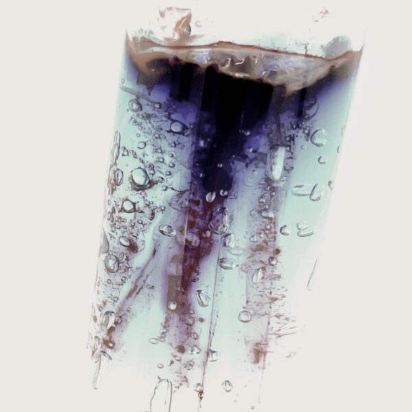 blue-purple-ink-in-fizzy-water-glass-test-tube