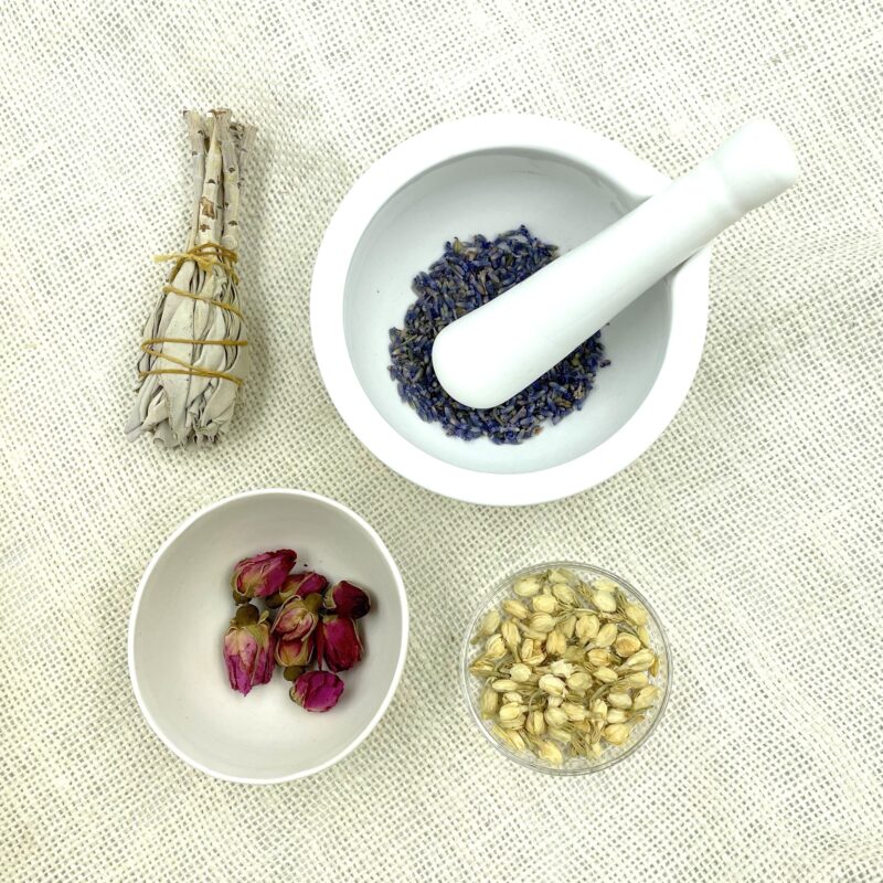 white-and-cream-ceramics-dried-flowers-petals-rosebuds-sage-sticks-hessian-material